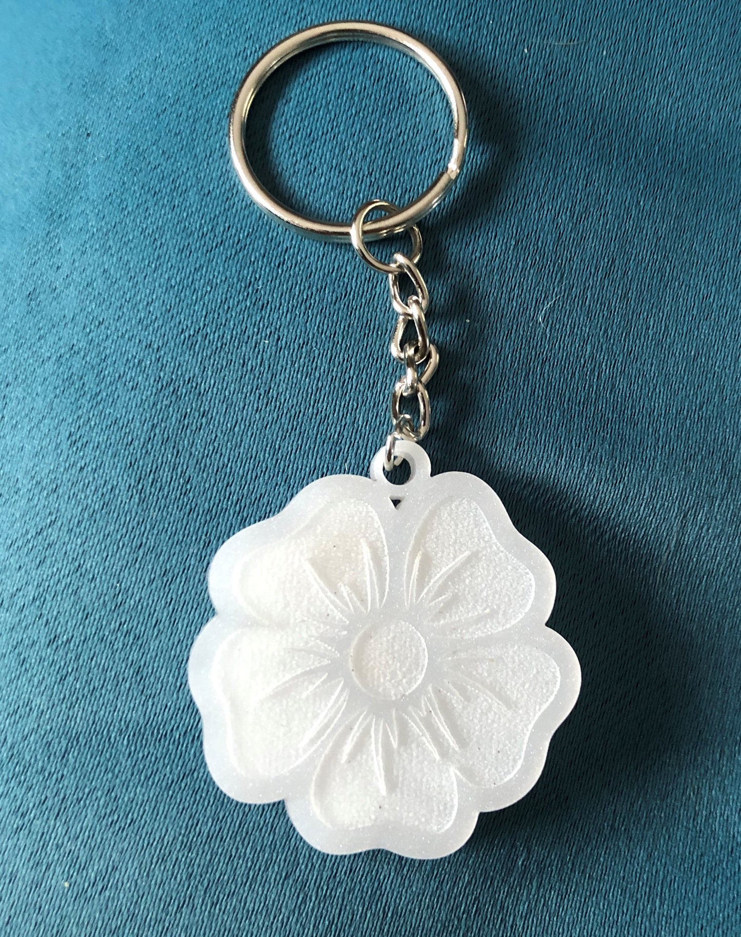 Elegant White Pearl Acrylic Keychain with Floral Engraving