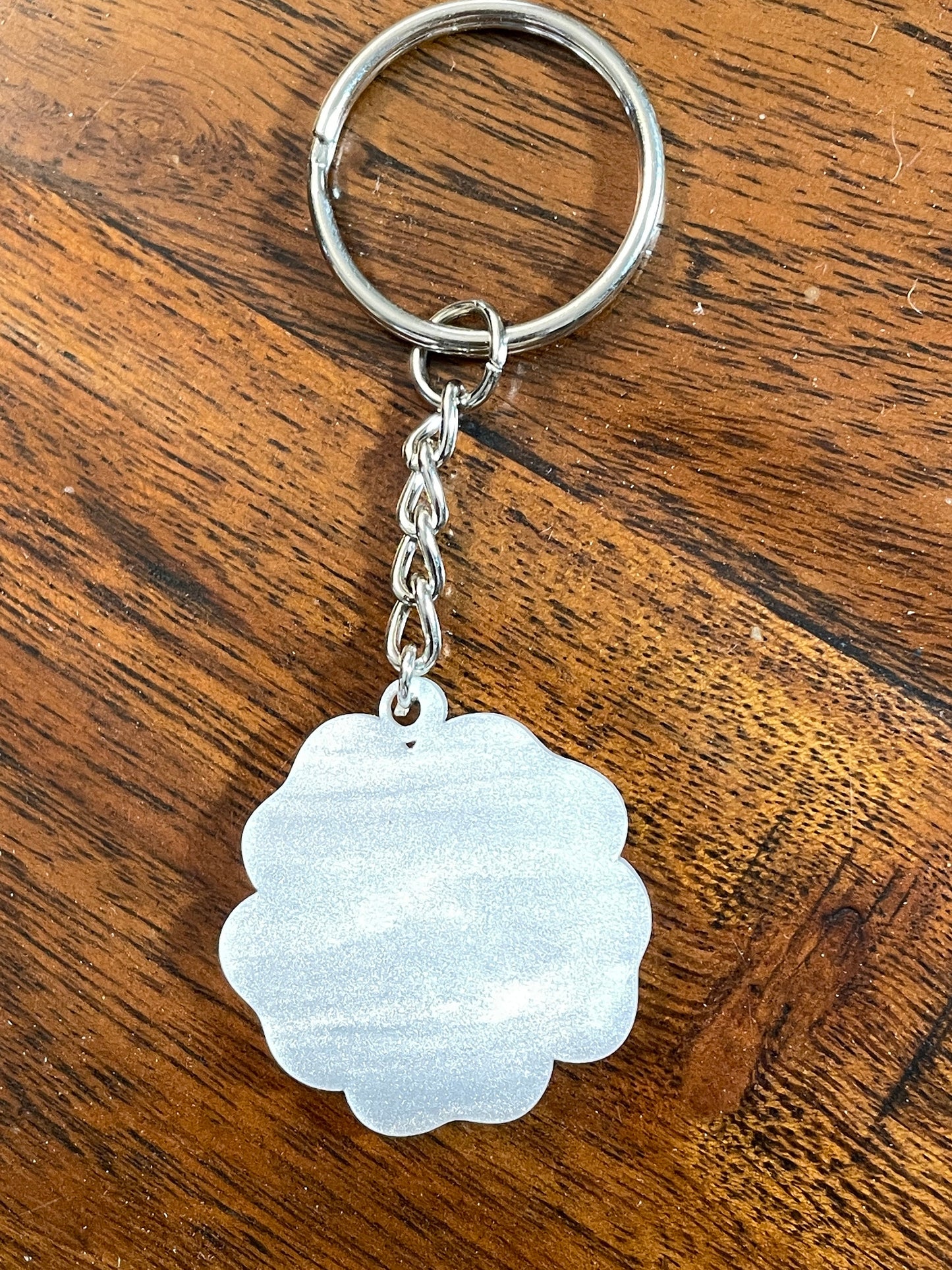 Elegant White Pearl Acrylic Keychain with Floral Engraving
